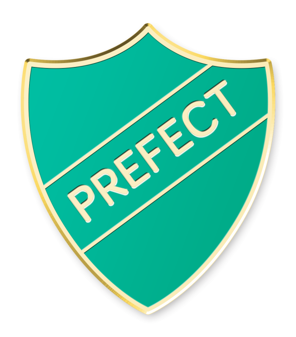 A classic prefect shield. A gold plated badge houses a green enamel and the word