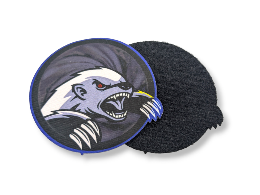 A hook and loop patch featuring a fearsome badger type thing.