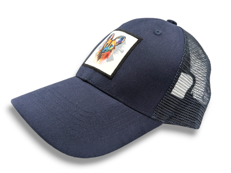 A blue trucker cap with a animal printed patch on the front.