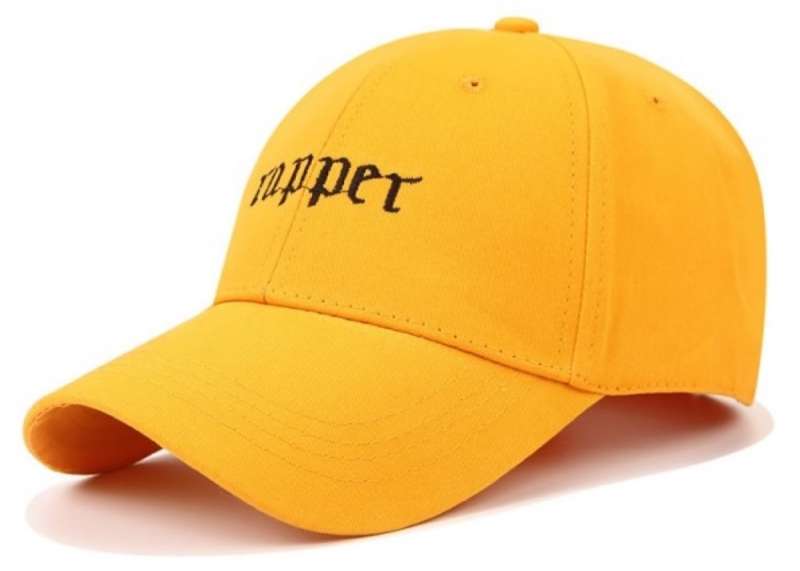 A bright yellow curved peak baseball cap with the word 