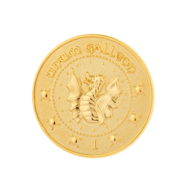 A shiny golden custom coin that has a small dragon on it.