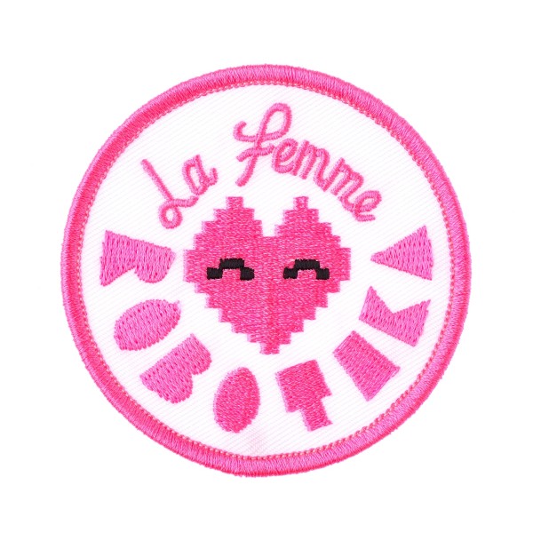 Pink circular patch with overlocked edge and an 8-bit love heart in the middle.