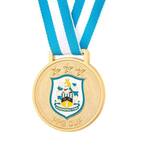 We made this custom medal for Huddersfield Town. It features their club crest, gold plating and optional blue and white ribbon.