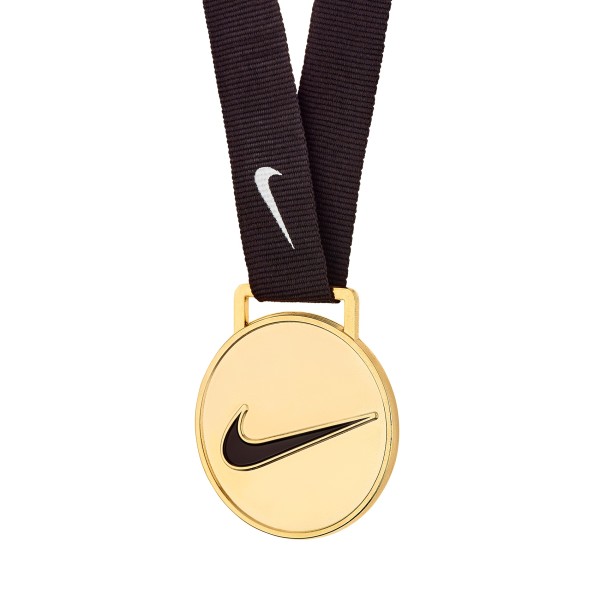 This gold plated Nike custom medal features their iconic logo in black alongside a black ribbon and white Nike tick.