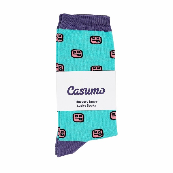 Blue and purple custom socks that are wrapped in a branded card that says