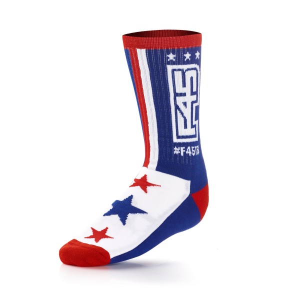 These blue, red, and white sports socks have a striking design that looks like the American flag with stars and stripes.