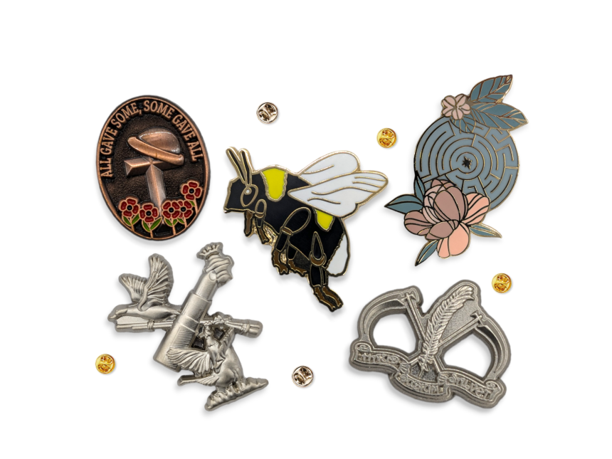 A collection of classic lapel pins and enamel badges to highlight the differences.