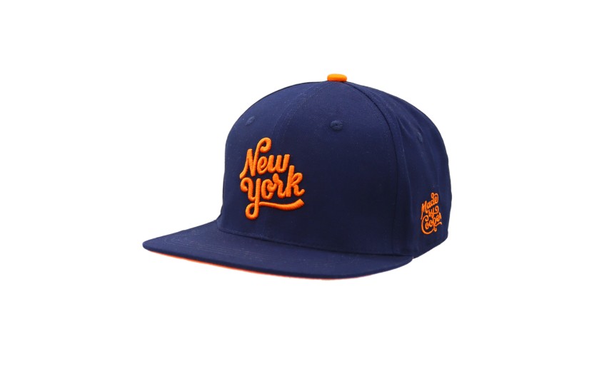 A dark blue baseball cap with orange New York logo, orange Made by Cooper side logo, and orange crown button.