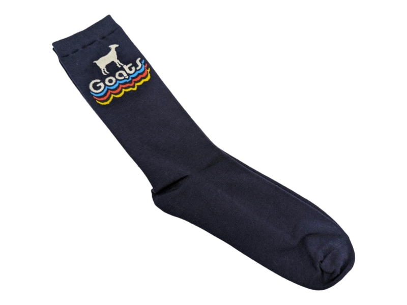 A pair of navy blue socks the an image of a goat near the top and the word 