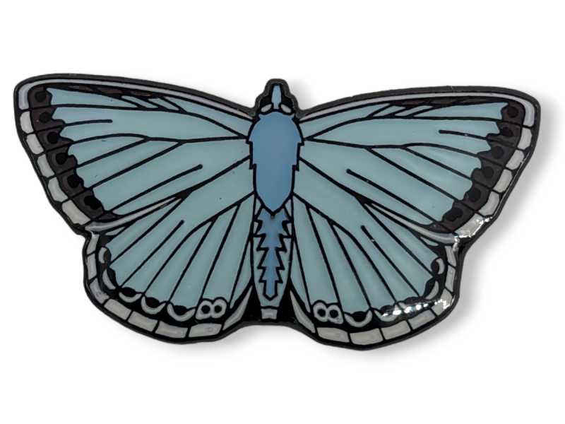 A beautiful blue soft enamel pin badge with an epoxy coating to give it a smooth finish.