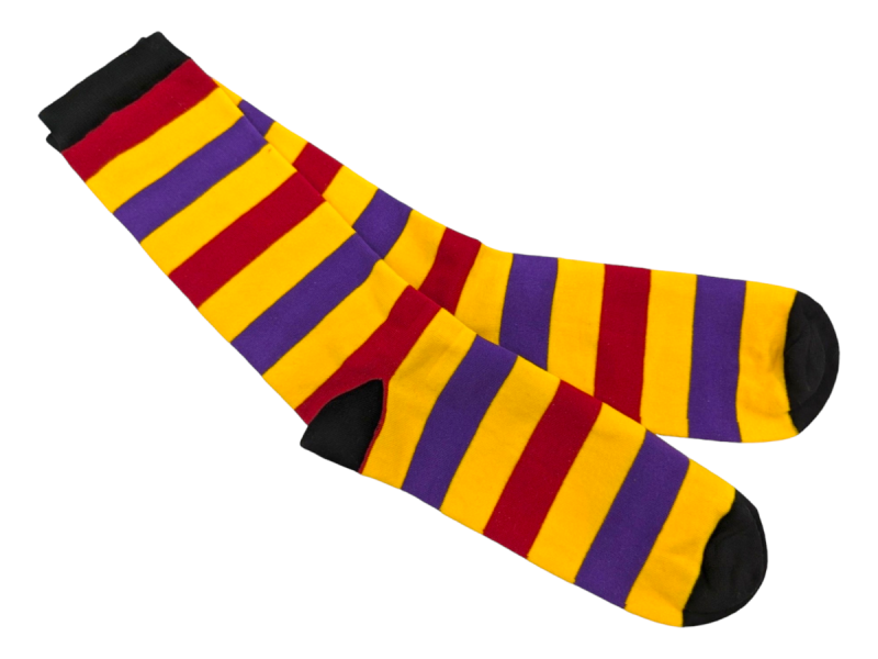 A pair of bright yellow socks with black heels, toes, and cuffs with purple and red stripes.