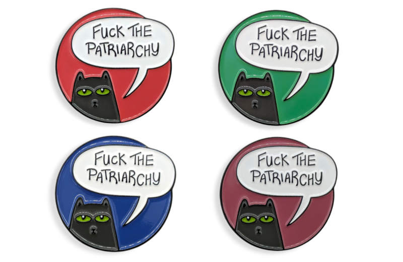 Four enamel pins of the same design featuring a cartoon cartoon with a speech bubble that says 