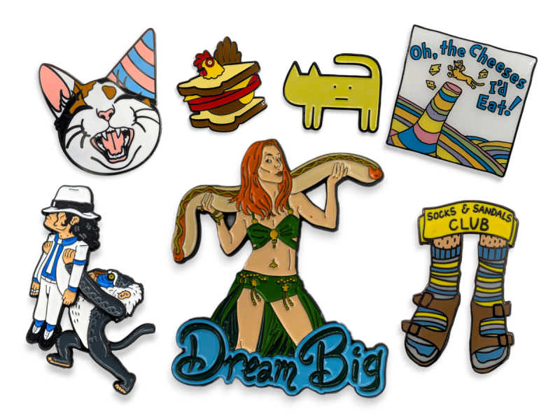 Some of the weirdest enamel pins ever. A cat with it's face halfway down its body, a woman in a bikini holding a hot dog so big it's like a snake, and Rakki from the Lion King holding Moonwalker Michael Jackson.