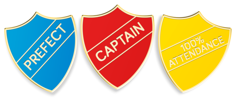 Three shield shaped enamel shields featuring the words Prefect, Captain, and 100% Attendance.